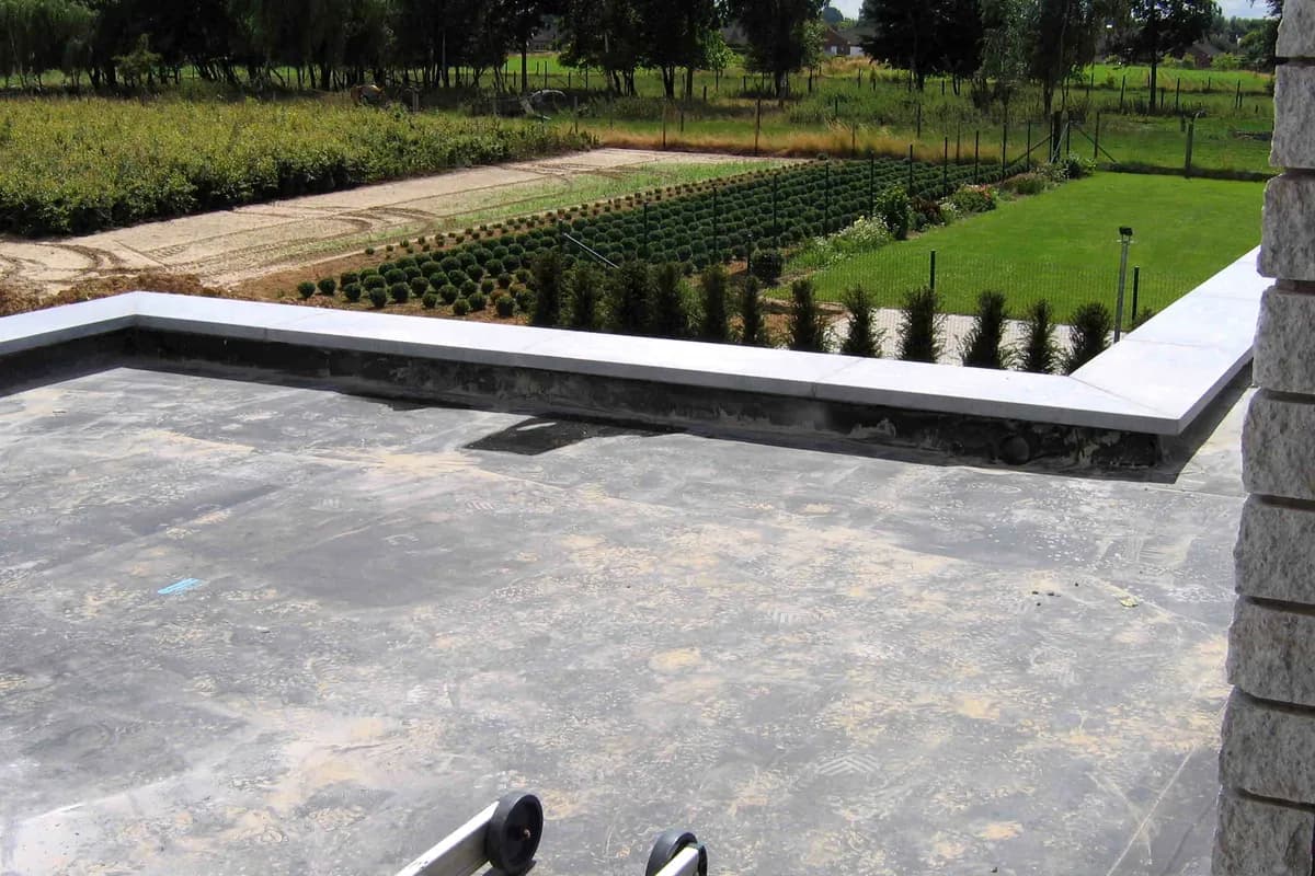 A completed low-slope roof covered with an EPDM membrane