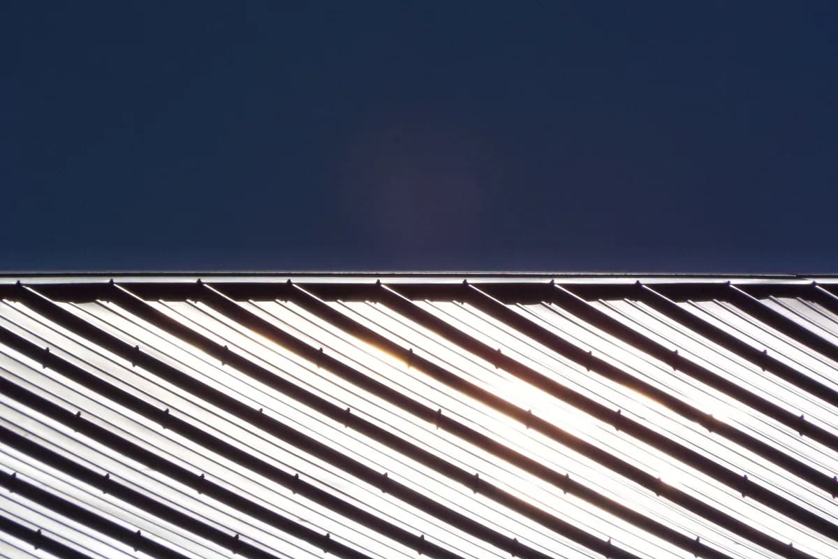 A metal roof catching direct sunlight